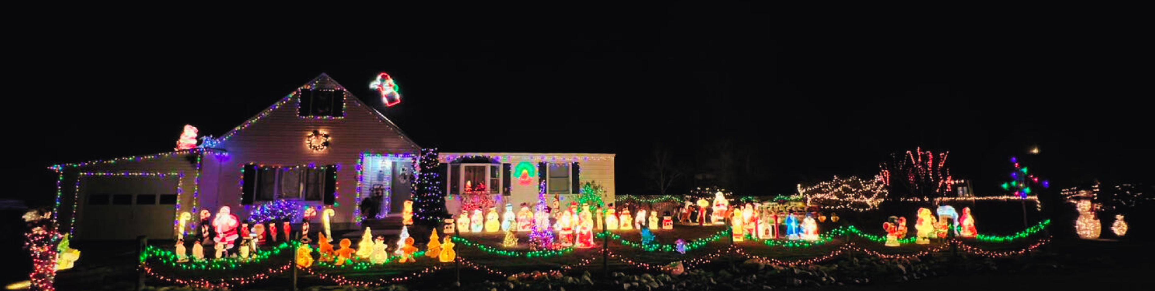 a house all lit up with holiday lights