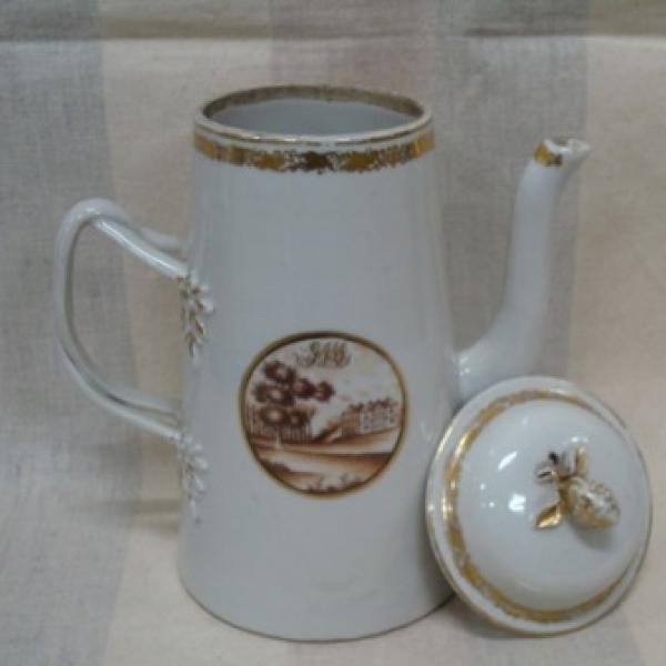 Porcelain coffee pot and lid dated 18th century.