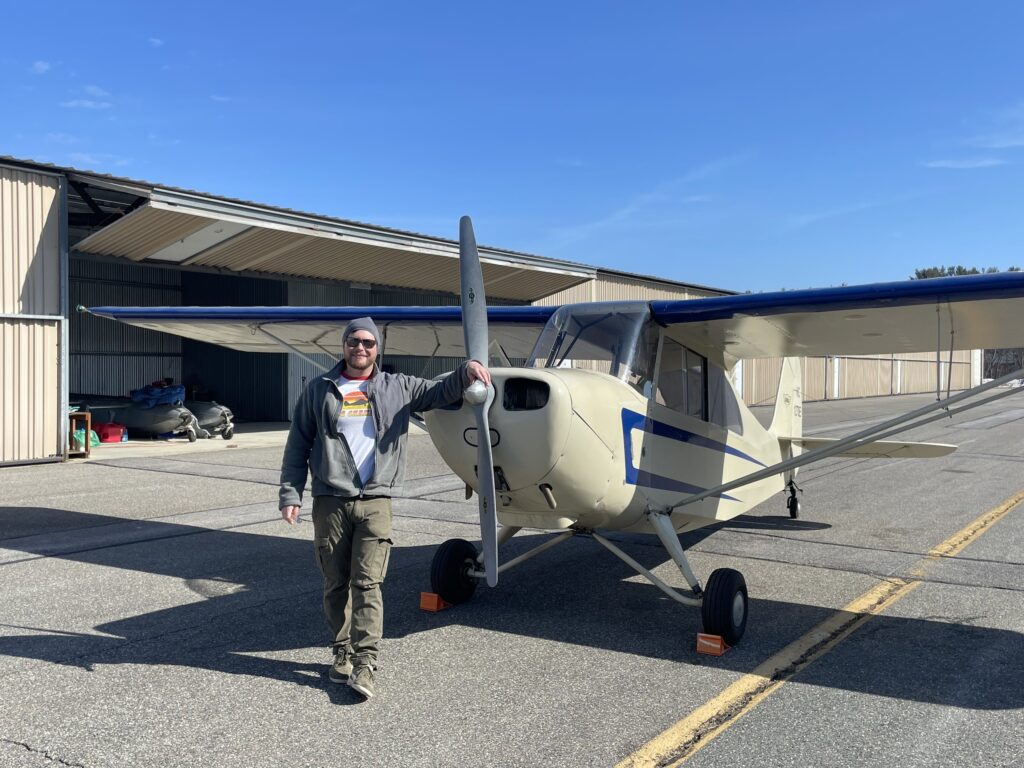 Pilot in front of plane