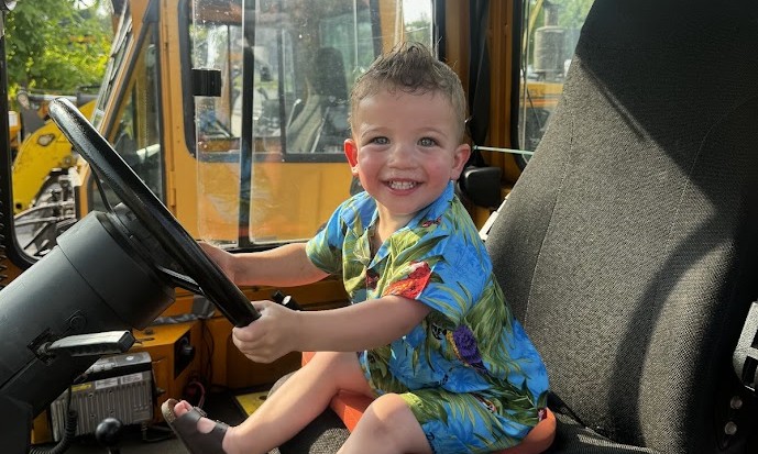 Toddler in Tractor Driver's Seat