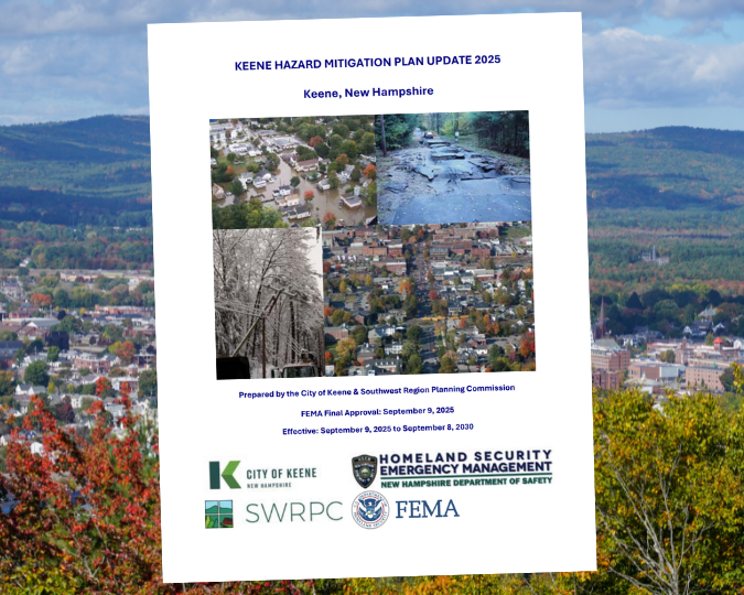 hazard mitigation plan document with town and hills in the background