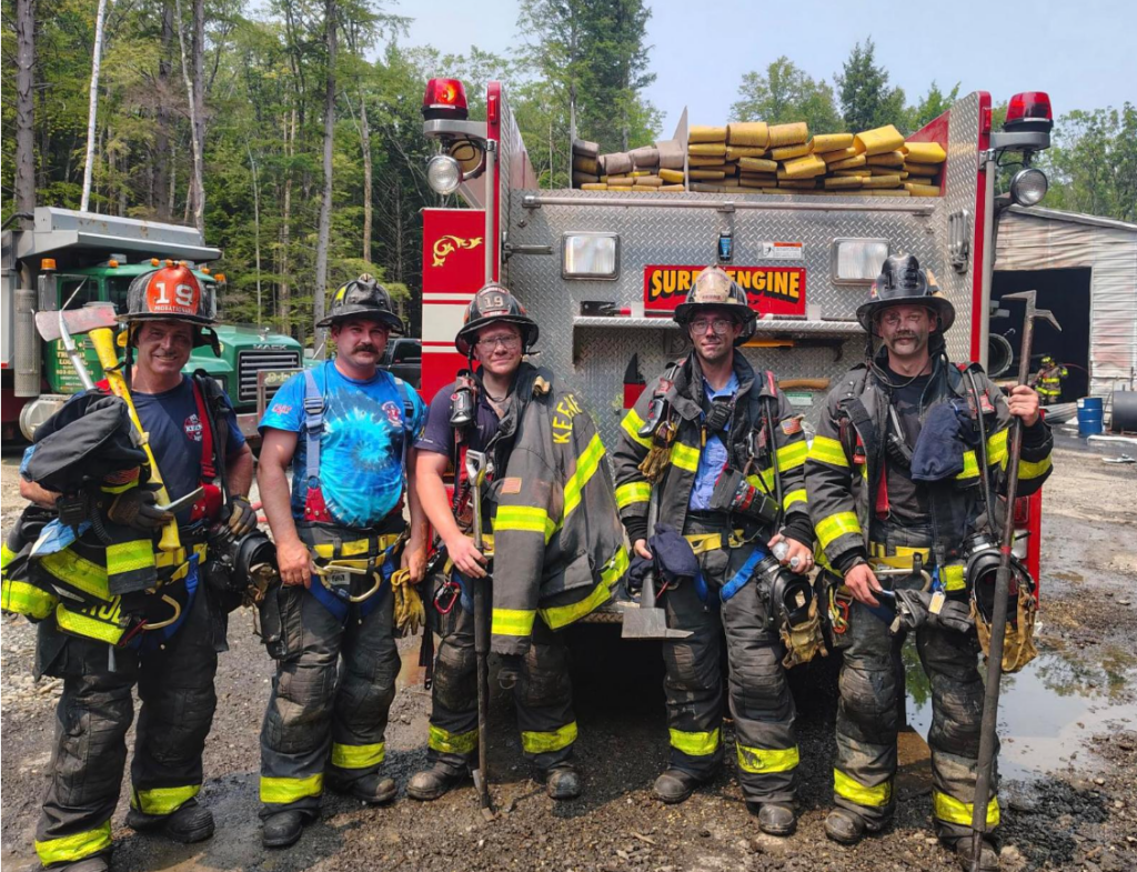 KFD crew behind fire engine