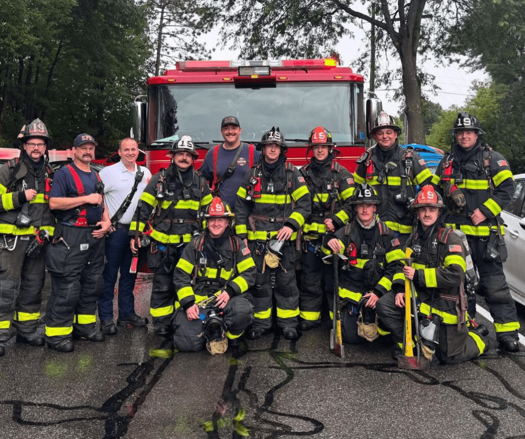 KFD crew in front of fire engine
