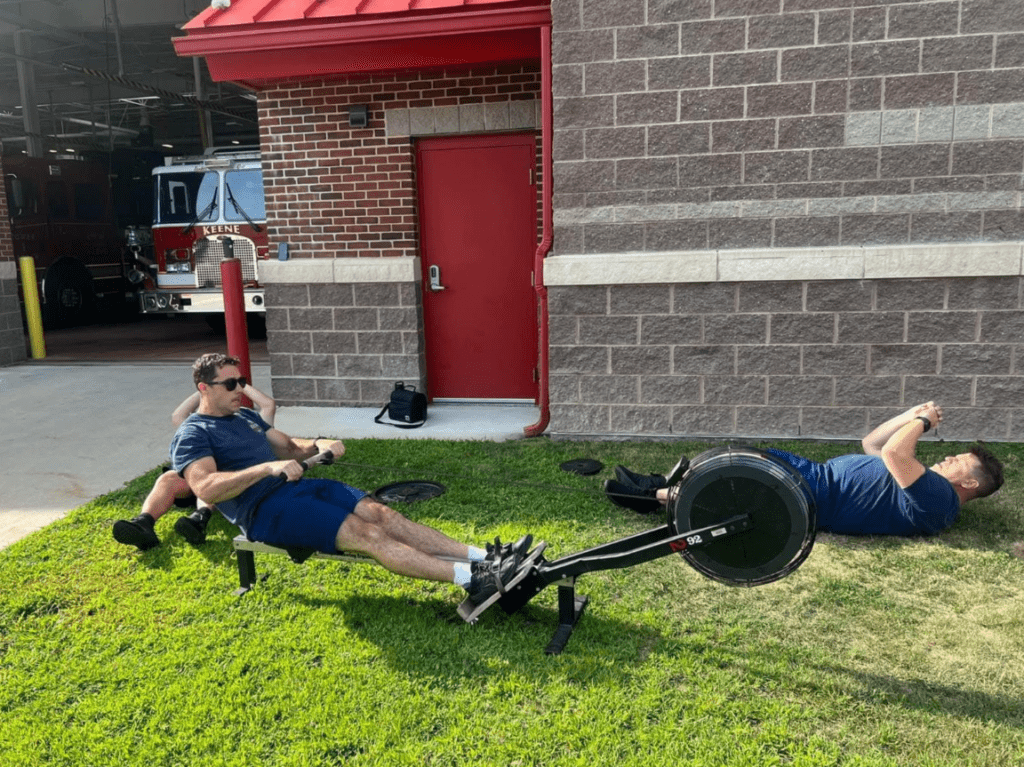 Firefighters using exercise equipment