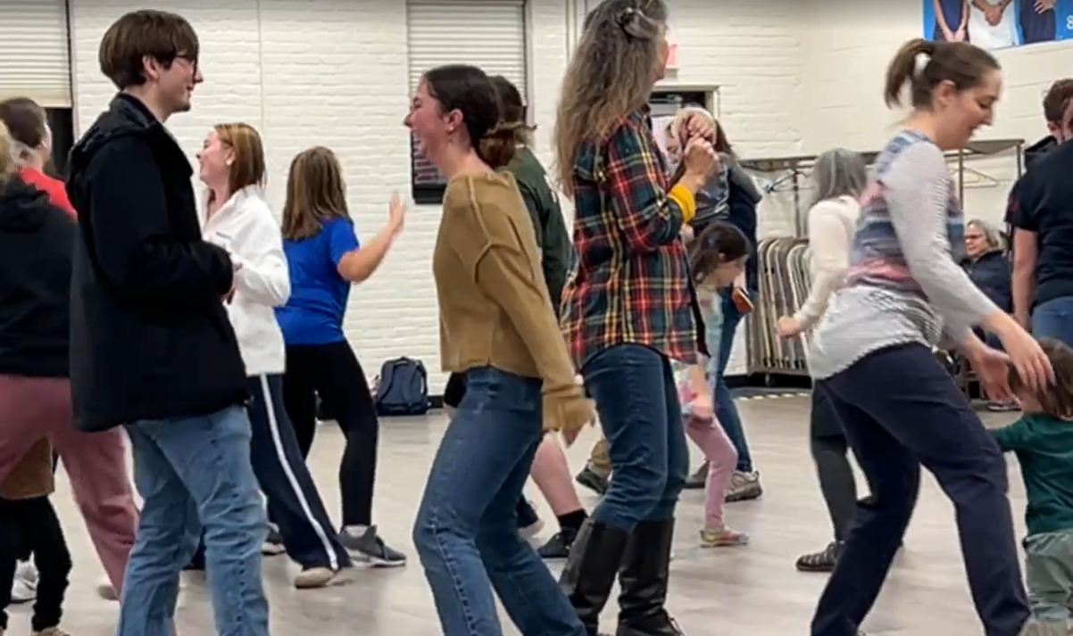 community members dancing at the recreation center